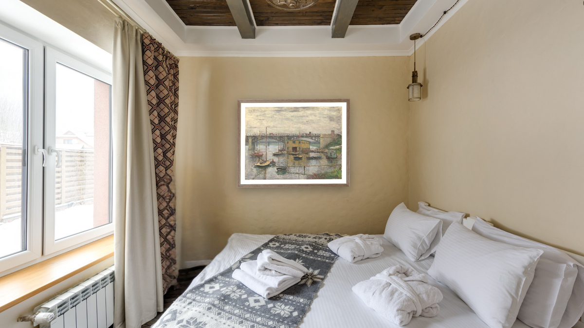 Bridge at Argenteuil on a Gray Day by Claude Monet, shown at 30 × 40 in (76.2 × 101.6 cm) in Arber Light Walnut, hotel guest room