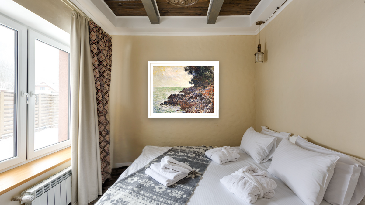 Cap Martin by Claude Monet, shown at 31 × 40 in (78.7 × 101.6 cm) in Arber Light Walnut, hotel guest room