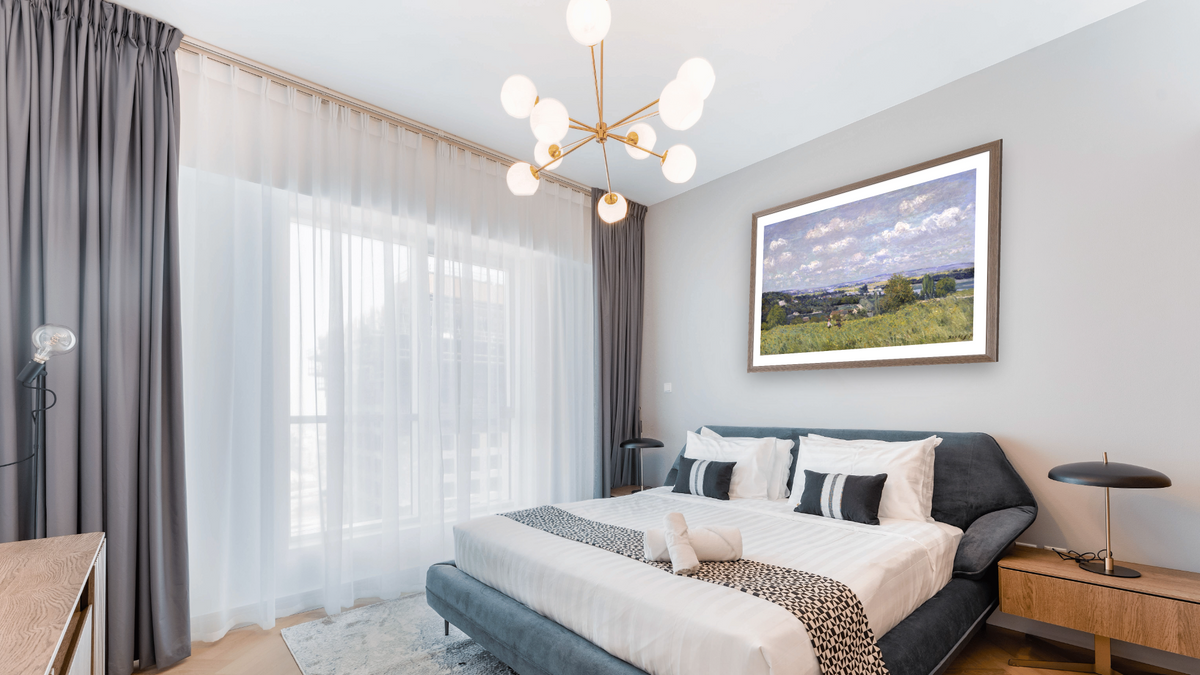 The Valley of the Seine at Saint-Cloud by Alfred Sisley, shown at 30 × 40 in (76.2 × 101.6 cm) in Arber Light Walnut, hotel guest room