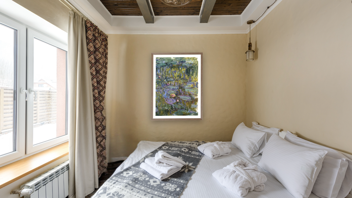 Water Lilies by Claude Monet, shown at 29 × 40 in (73.7 × 101.6 cm) in Arber Light Walnut, hotel guest room