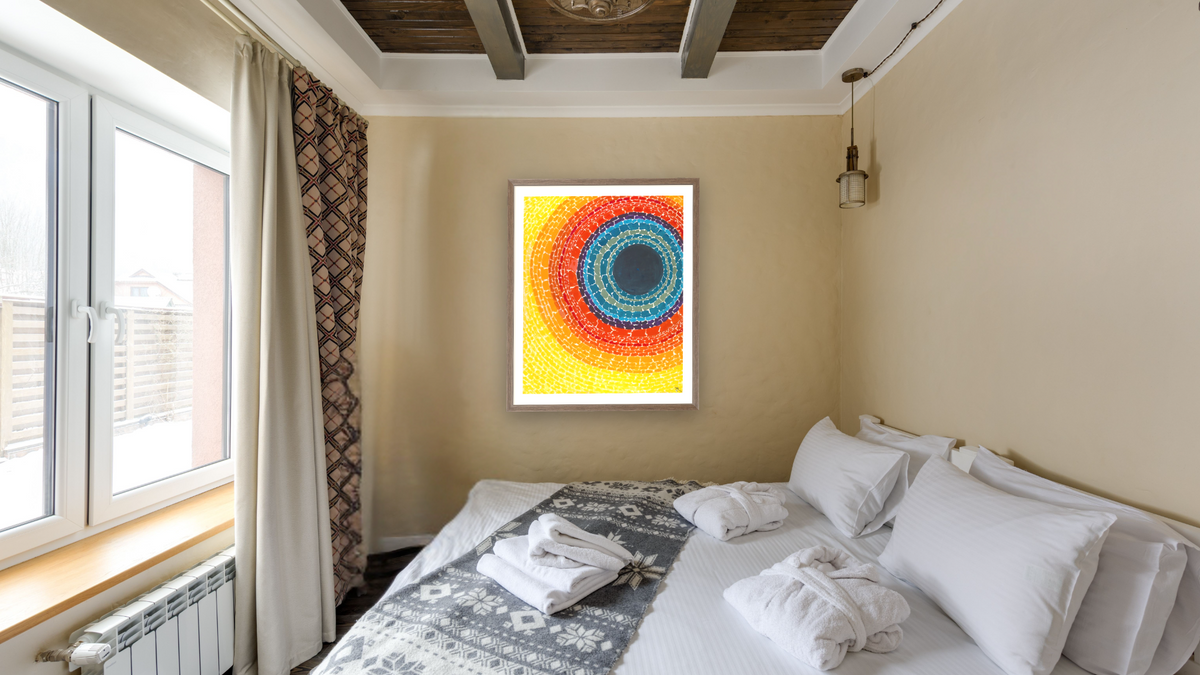 The Eclipse by Alma Thomas, shown at 32 × 40 in (81.3 × 101.6 cm) in Arber Light Walnut, hotel guest room