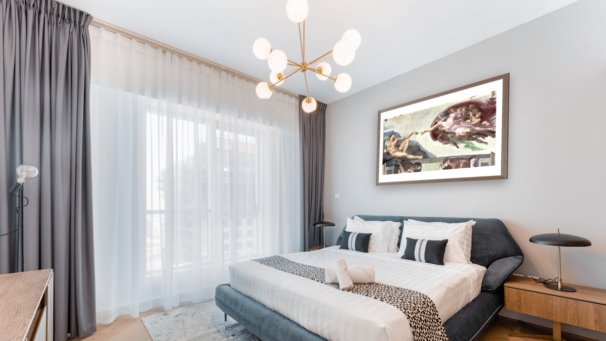 Sistine Chapel Ceiling: The Creation of Adam (post restoration) by Michelangelo Buonarroti, shown at 28 × 42 in (71.1 × 106.7 cm) in Arber Light Walnut, hotel guest room