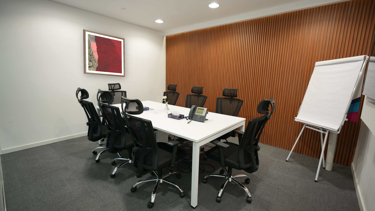 No. 4, shown at 32 × 32 in (81.3 × 81.3 cm) in Arber Light Walnut, boardroom