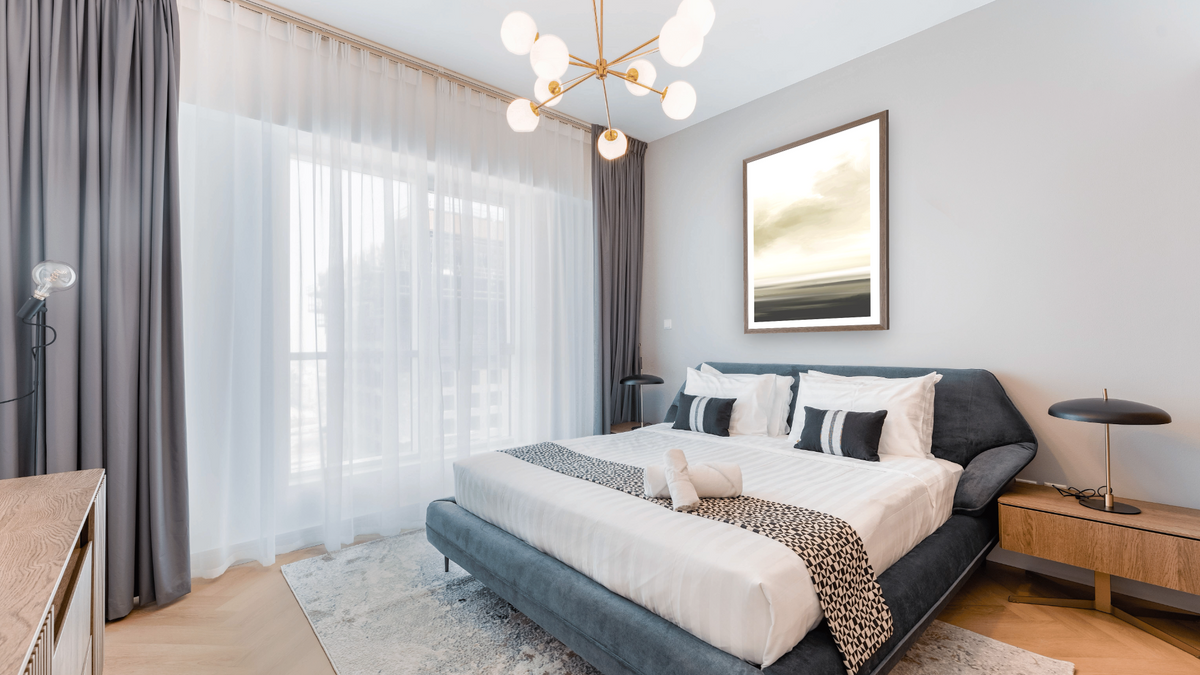 Marsh Set 3 by Dan Hobday, shown at 30 × 42 in (76.2 × 106.7 cm) in Arber Light Walnut, hotel guest room