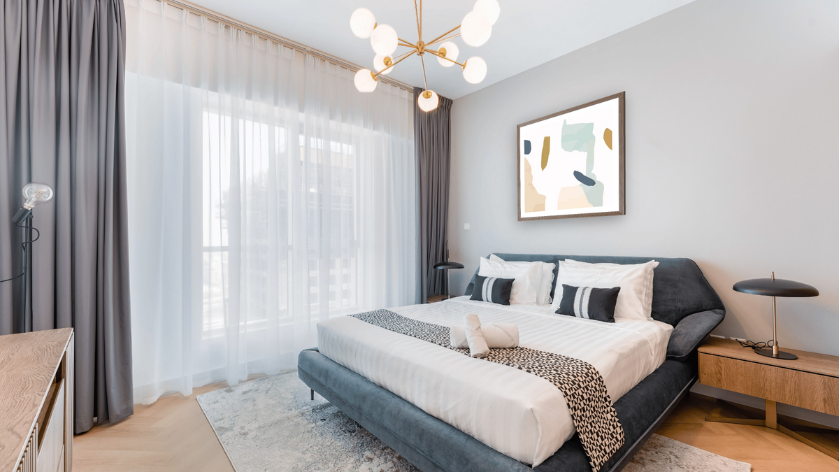 Mez Set 2 by Dan Hobday, shown at 32 × 32 in (81.3 × 81.3 cm) in Arber Light Walnut, hotel guest room