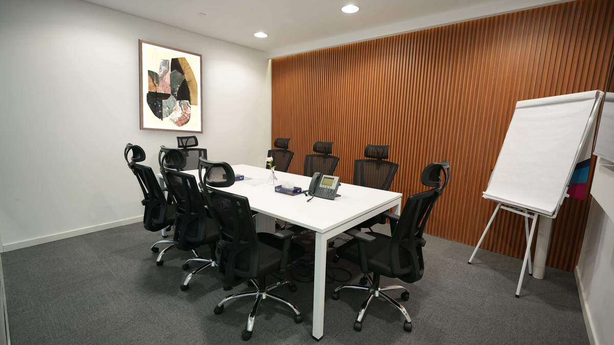 Essence by Dan Hobday, shown at 30 × 42 in (76.2 × 106.7 cm) in Arber Light Walnut, boardroom