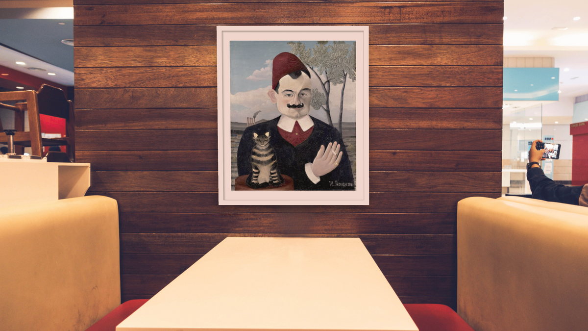 Portrait of Monsieur X (Pierre Loti) by Henri Rousseau, shown at 32 × 40 in (81.3 × 101.6 cm) in Arber Light Walnut, restaurant