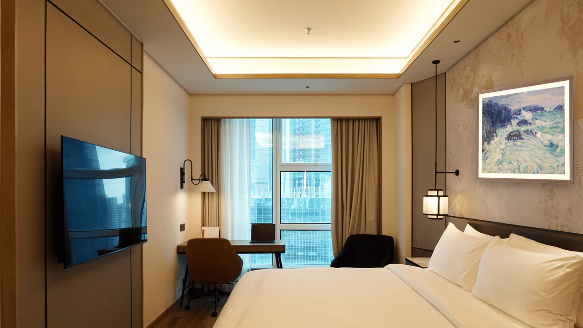Rough sea, Morestil by John Peter Russell, shown at 32 × 40 in (81.3 × 101.6 cm) in Arber Light Walnut, hotel guest room