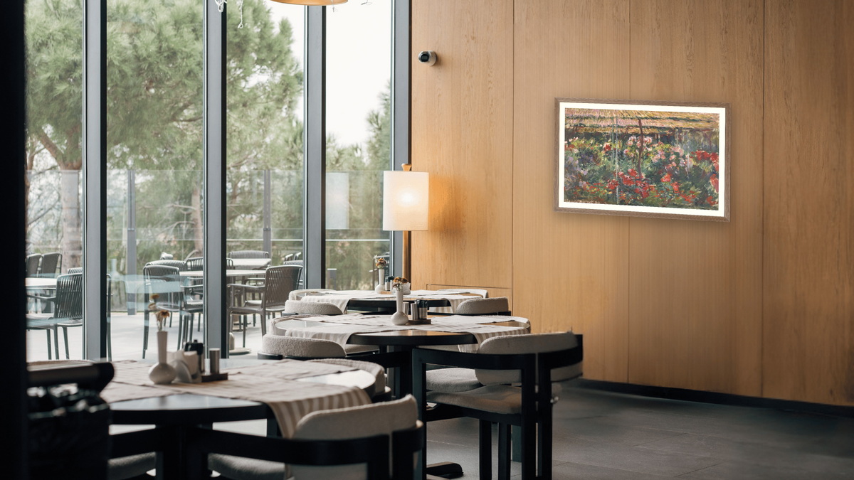 Peony Garden by Claude Monet, shown at 26 × 42 in (66 × 106.7 cm) in Arber Light Walnut, restaurant