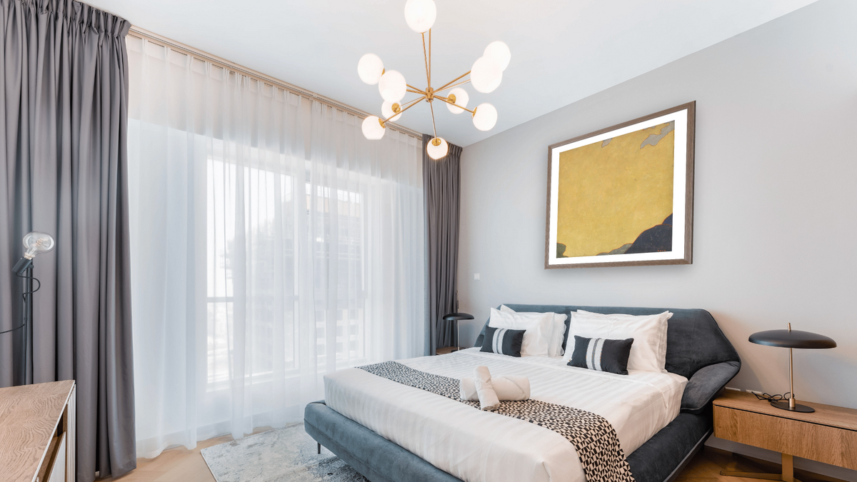 Evening by Augustus Vincent Tack, shown at 32 × 32 in (81.3 × 81.3 cm) in Arber Light Walnut, hotel guest room