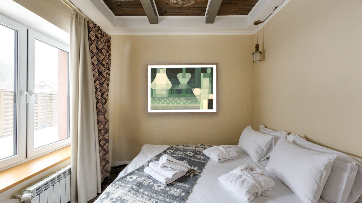Floodgates by Paul Klee, shown at 28 × 42 in (71.1 × 106.7 cm) in Arber Light Walnut, hotel guest room