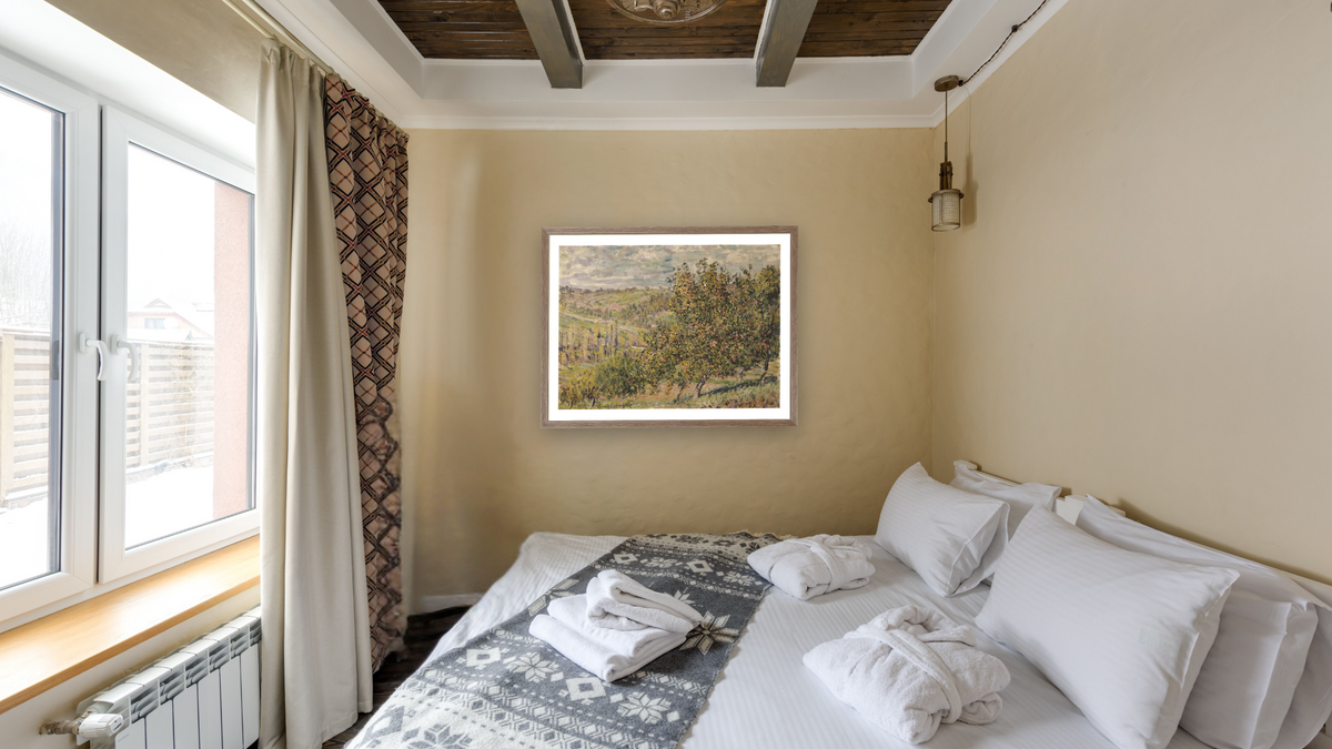 Apple Blossom by Claude Monet, shown at 30 × 40 in (76.2 × 101.6 cm) in Arber Light Walnut, hotel guest room