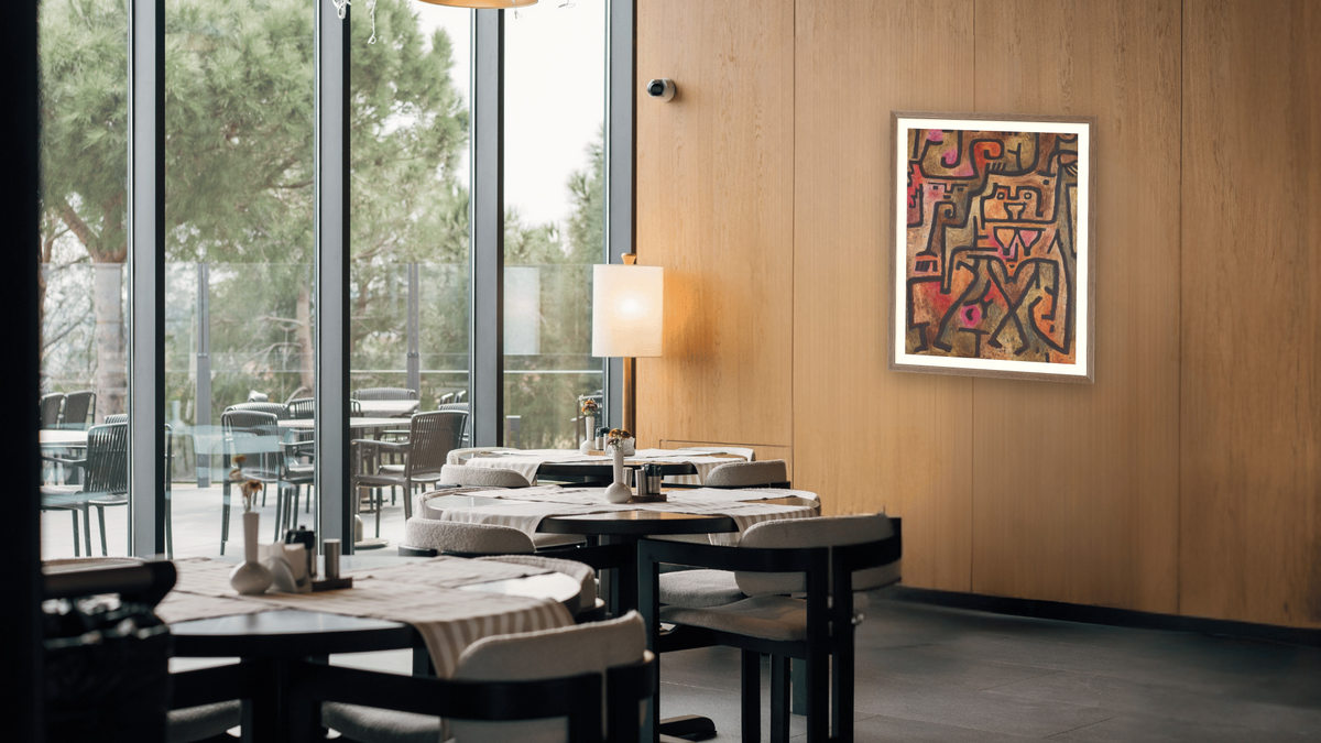 Forest Witches by Paul Klee, shown at 30 × 40 in (76.2 × 101.6 cm) in Arber Light Walnut, restaurant