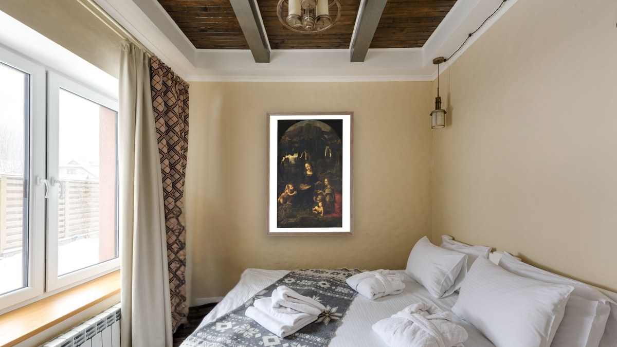 Madonna of the Rocks by Leonardo da Vinci, shown at 28 × 42 in (71.1 × 106.7 cm) in Arber Light Walnut, hotel guest room