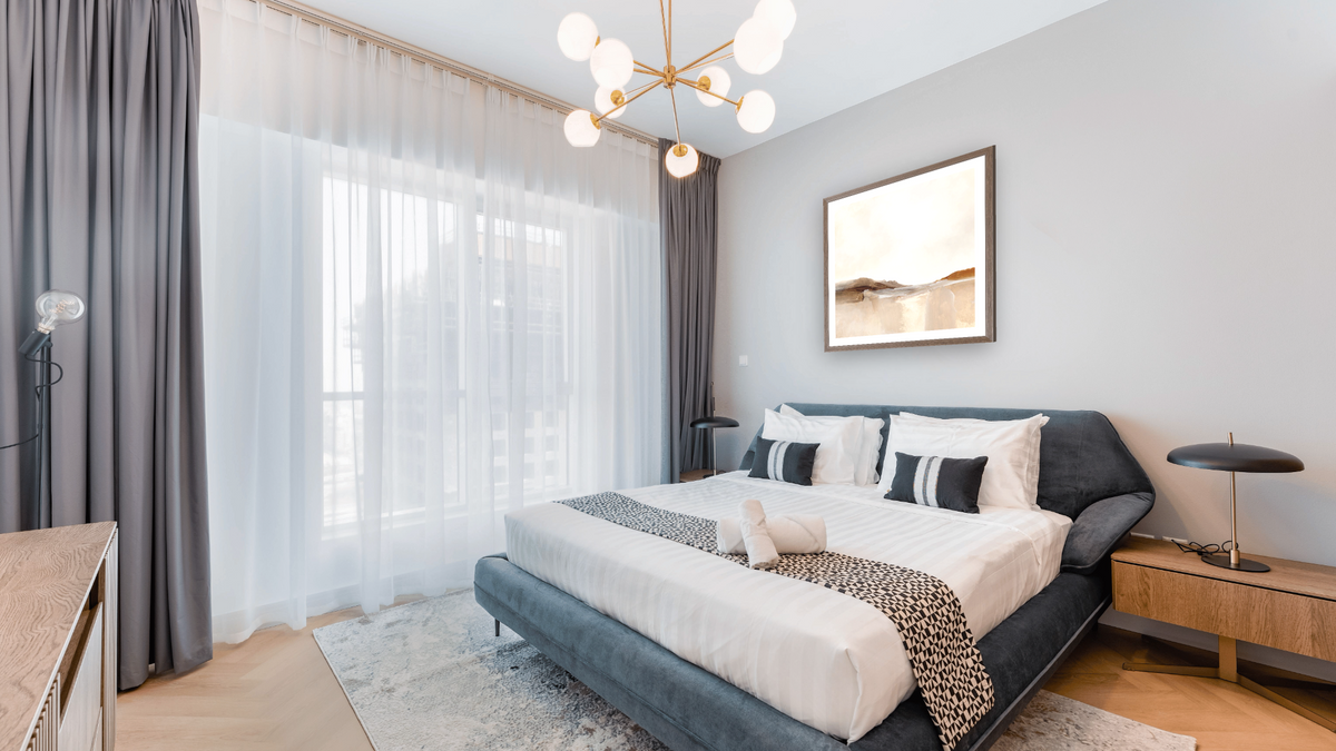 Colorado by Dan Hobday, shown at 32 × 32 in (81.3 × 81.3 cm) in Arber Light Walnut, hotel guest room