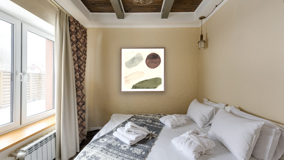 Days 1 by Dan Hobday, shown at 32 × 32 in (81.3 × 81.3 cm) in Arber Light Walnut, hotel guest room