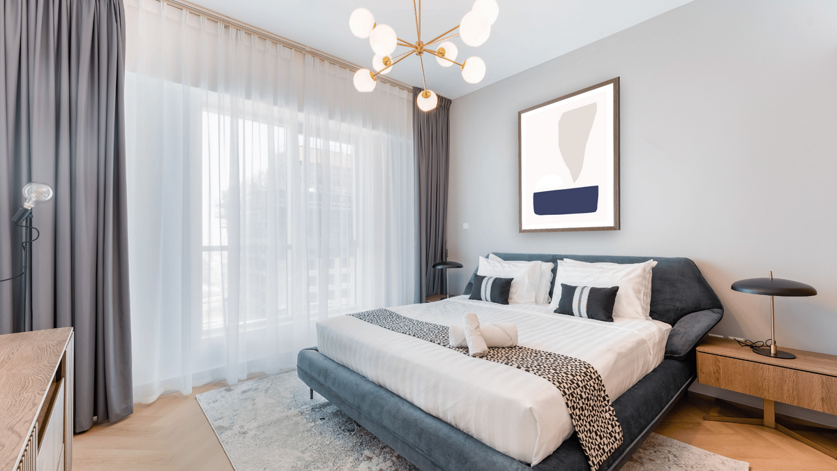 Minimal Set 1 by Dan Hobday, shown at 30 × 42 in (76.2 × 106.7 cm) in Arber Light Walnut, hotel guest room