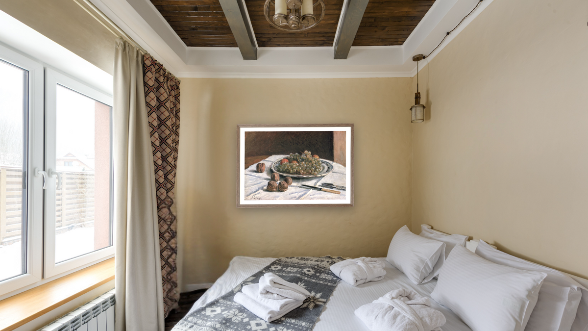 Grapes and Walnuts by Alfred Sisley, shown at 28 × 42 in (71.1 × 106.7 cm) in Arber Light Walnut, hotel guest room