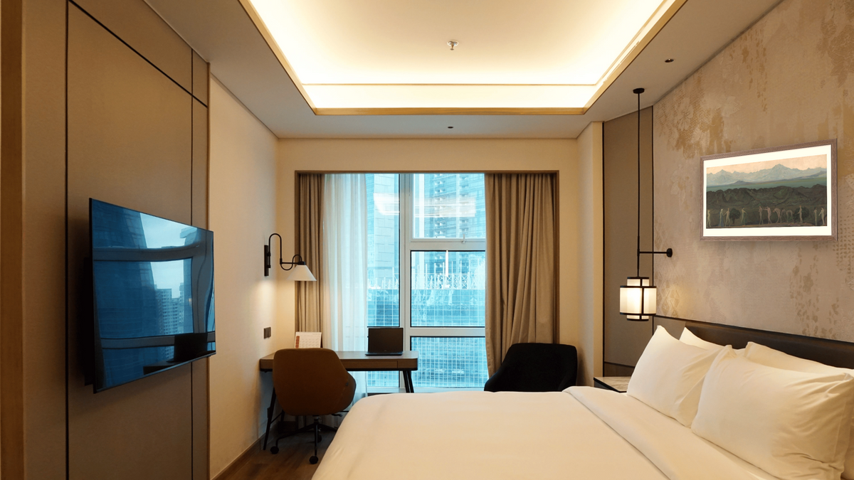 Line of Mountains by Arthur Bowen Davies, shown at 20 × 40 in (50.8 × 101.6 cm) in Arber Light Walnut, hotel guest room