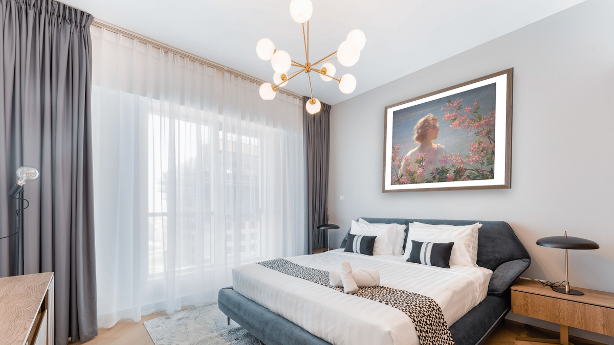 The Breath of the Wild Azalea by Charles Courtney Curran, shown at 32 × 40 in (81.3 × 101.6 cm) in Arber Light Walnut, hotel guest room