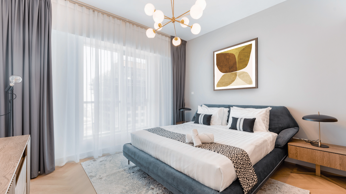 Flower Canvas by Dan Hobday, shown at 32 × 32 in (81.3 × 81.3 cm) in Arber Light Walnut, hotel guest room