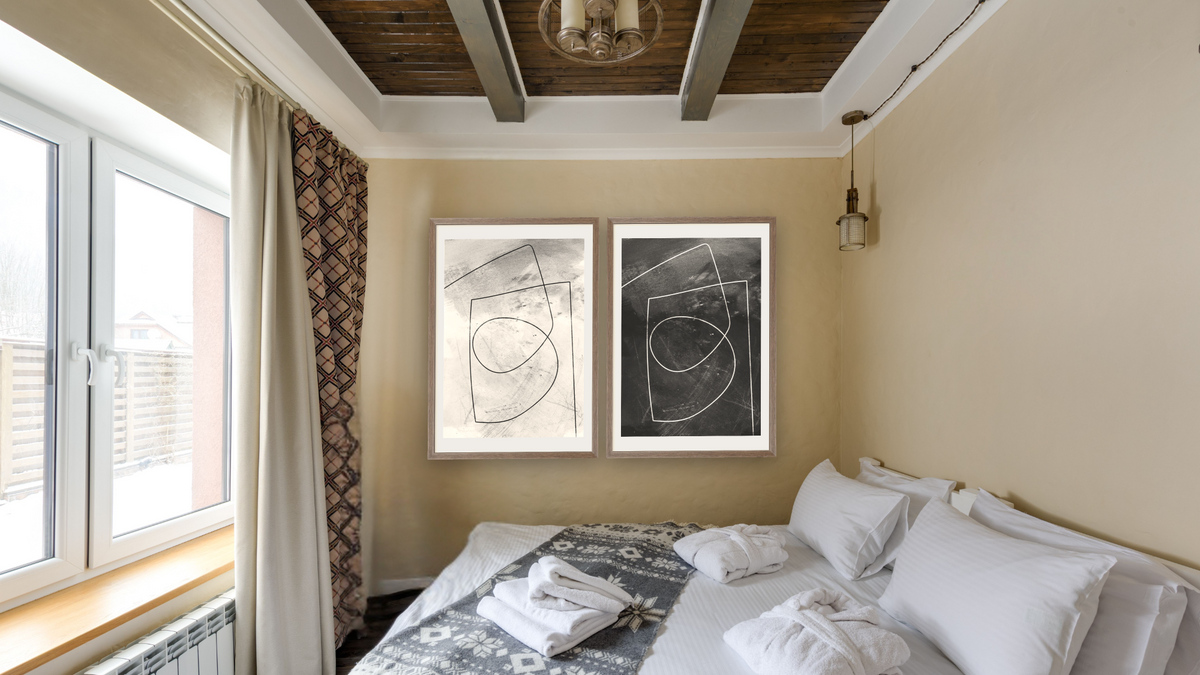 Diptych — Minimal Line 2 × Minimal Line 1, shown at 28 × 42 in (71.1 × 106.7 cm) in Arber Light Walnut, hotel guest room