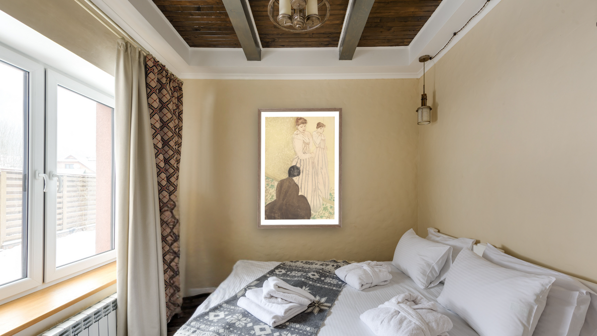 The Fitting by Mary Cassatt, shown at 28 × 42 in (71.1 × 106.7 cm) in Arber Light Walnut, hotel guest room