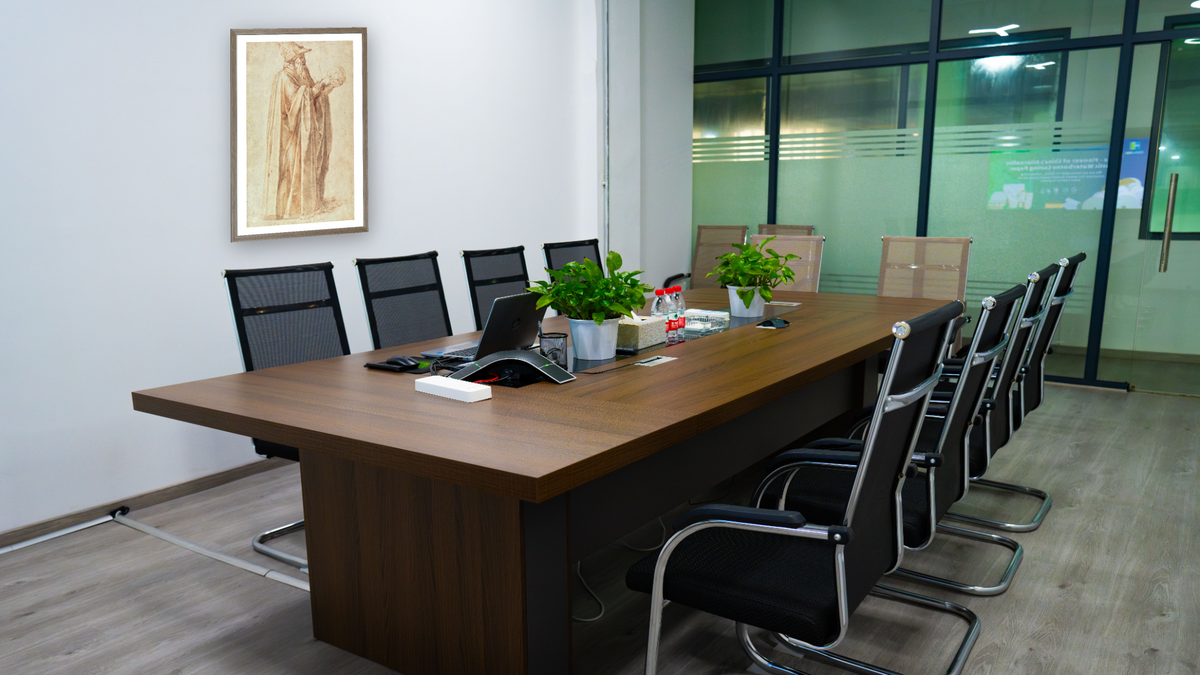Study of a Man by Michelangelo Buonarroti, shown at 28 × 42 in (71.1 × 106.7 cm) in Arber Light Walnut, boardroom